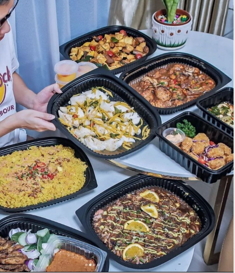 Mini buffet packages - Set B, several black trays with various food
